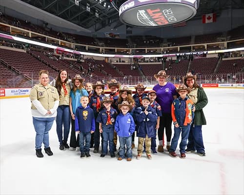 Photo of a scout group on the ice at GIANT Center.