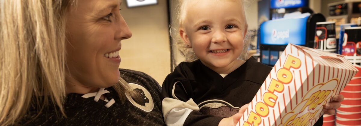 Child holding Pop at Hershey Bears concessions stand