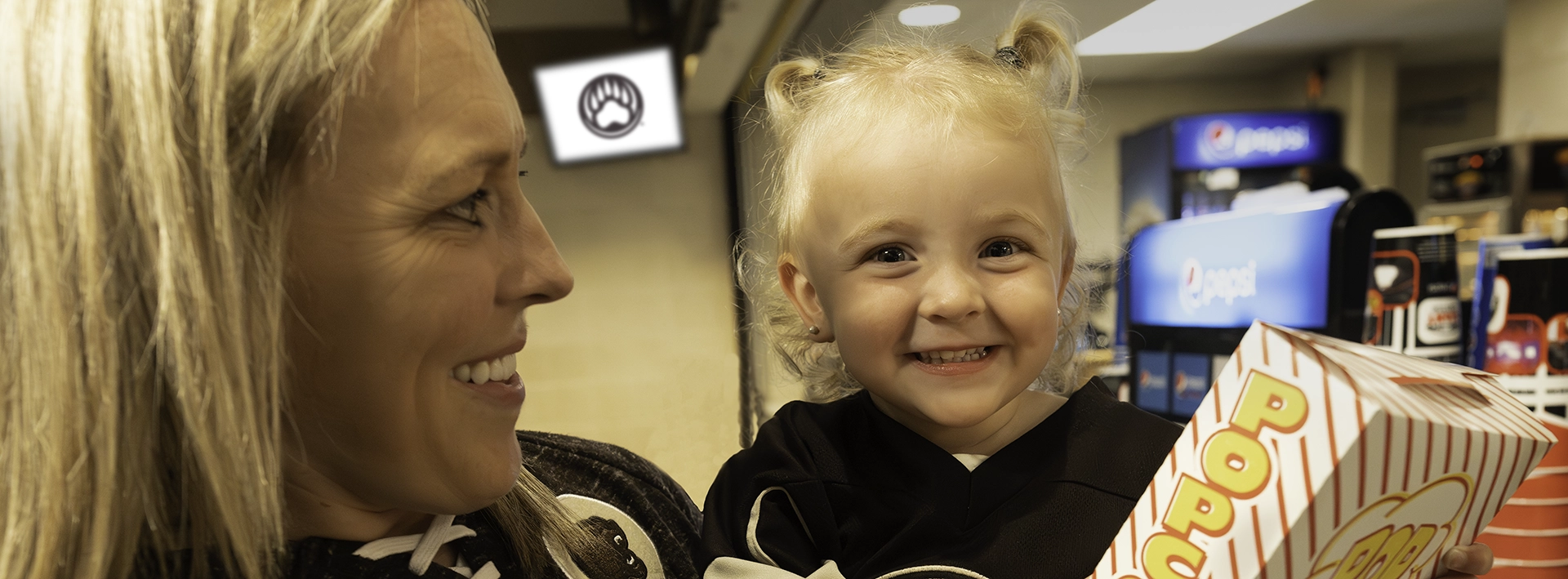 Child holding Pop at Hershey Bears concessions stand