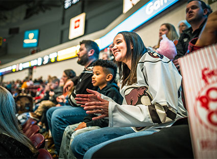 Mother and son cheering on the Bears
