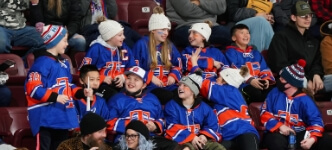 Group of kids enjoying Hershey Bears game